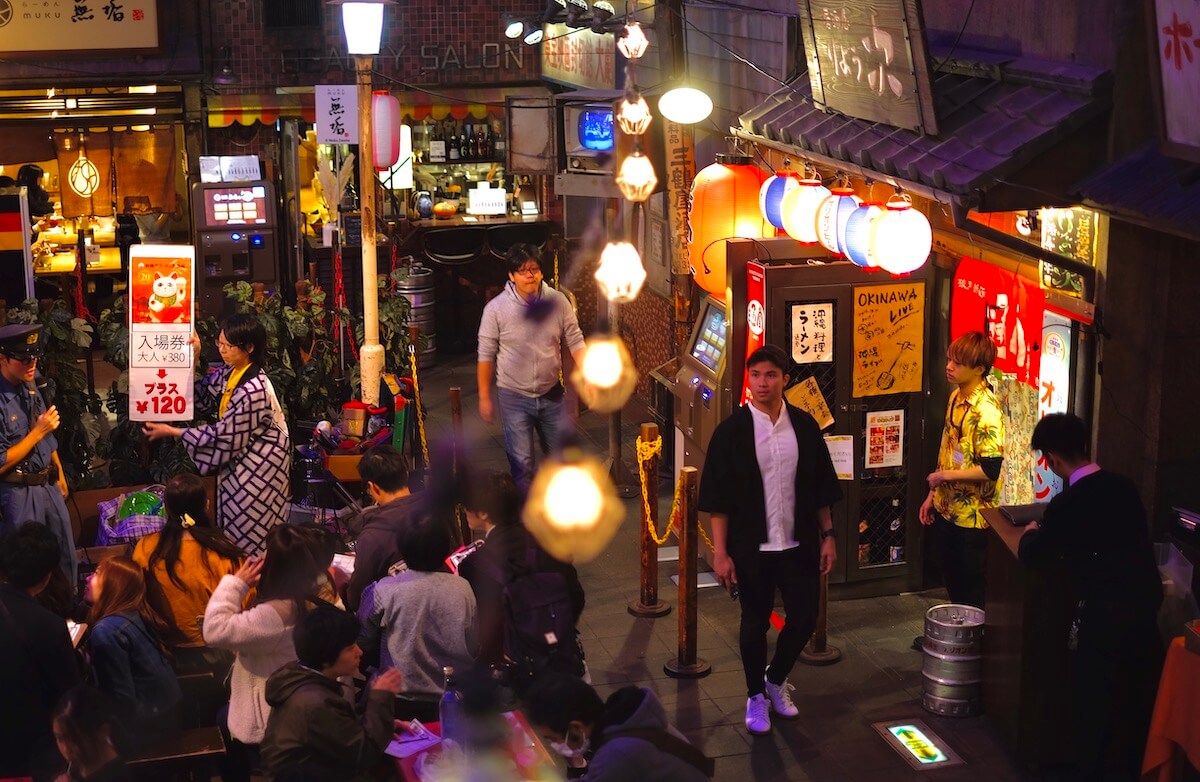 Man standing in a crowded place in Japan