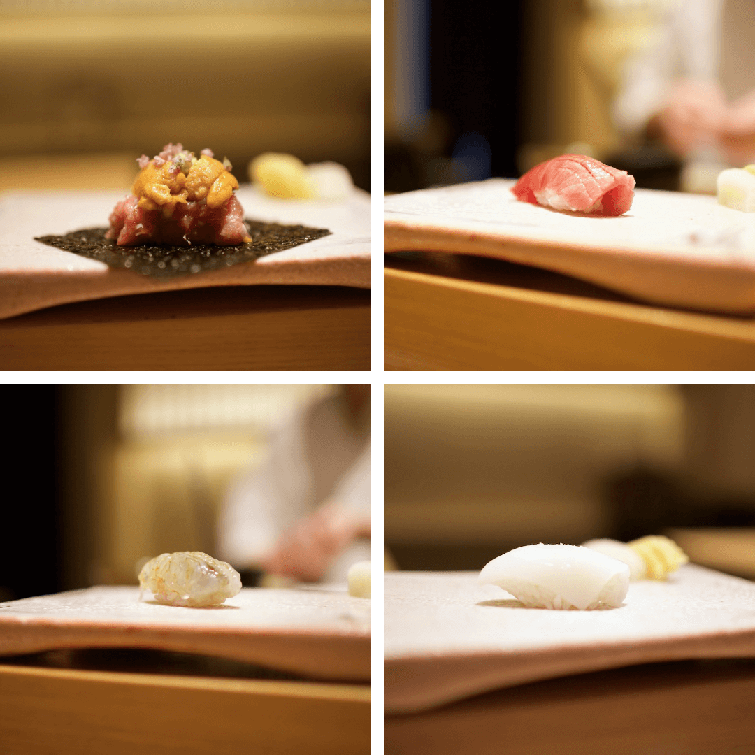 Four pieces of sushi with different seafood
